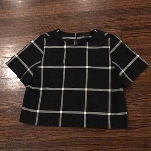 Slightly cropped, large plaid short sleeve top